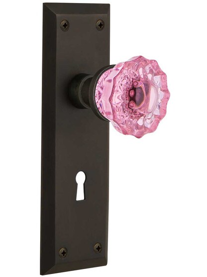 New York Door Set with Keyhole and Colored Fluted Crystal Glass Knobs Pink in Oil-Rubbed Bronze.